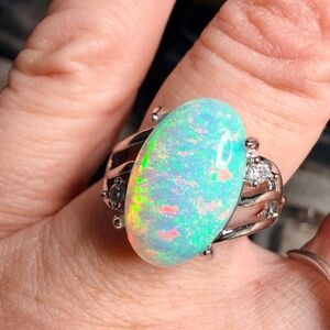 Gorgeous huge pinfire 4.1 carat Ethiopian opal adjustable ring